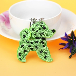 Porte-clés chien en strass vert avec pompon élégant pour sacs à main de femme