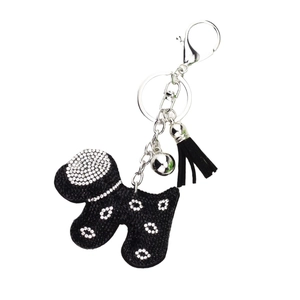 Sparkling velvet dog keychain with rhinestones, black suede tassel, and silver hardware