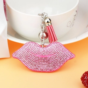 Pink rhinestone lip keychain with leather tassel and bell, stylish bag charm for women