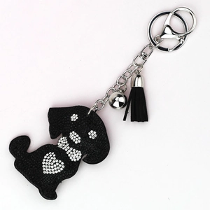 Cute black dog keychain with white rhinestones, silver bell and suede tassel charm