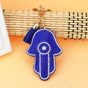 Blue Hamsa Hand keychain with rhinestones and tassel detail for car and bag decor