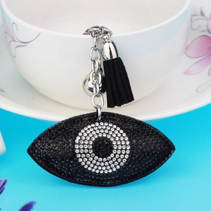 Sparkling Evil Eye keychain with black suede tassel and rhinestones on a silver metal chain