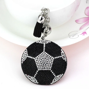Porte-clés ballon de foot avec strass noirs et blancs et élégant gland en velours noir