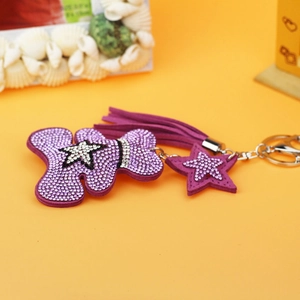 Creative purple teddy bear keychain with rhinestones and matching tassel accessory