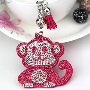 Cute cartoon monkey keychain with rhinestones, metal bell and purple tassel for bags