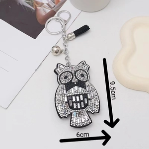Sparkling rhinestone owl keychain with black tassel and bell, height 9.5cm and width 6cm
