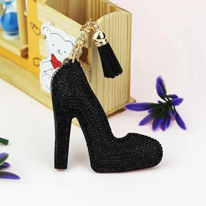 Sparkling rhinestone high heel keychain with black tassel and golden metal clip