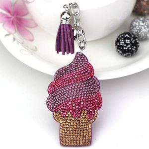 Sparkling ice cream keychain with gradient crystals, purple tassel, and silver chain detail