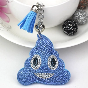 Blue rhinestone-studded poop emoji keychain with velvet tassel and silver bell
