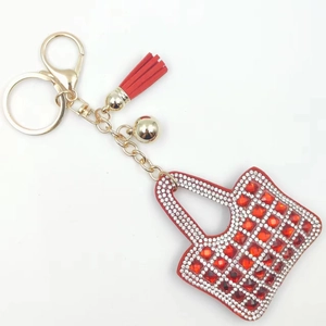 Fashionable red rhinestone handbag keychain with golden tassel and lobster clasp