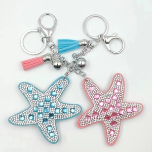 Starfish keychain pendant with sparkling crystals and colorful leather tassels