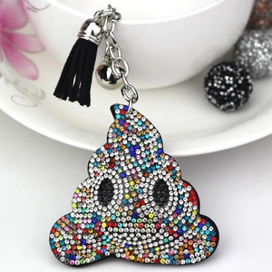 Creative rhinestone poop emoji keychain with colorful crystals and black tassel charm