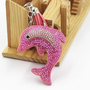 Porte-clés dauphin en cuir avec strass et pompon rose pour sacs à main