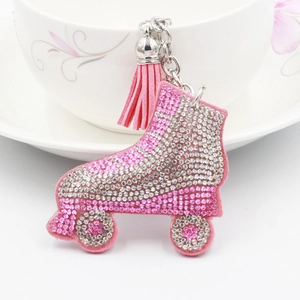 Pink rhinestone roller skate keychain with tassel charm and silver alloy ring for handbags