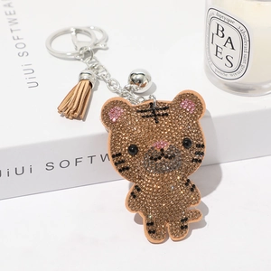 Porte-clés tigre classique en strass marron avec un accessoire à pompon en cuir souple