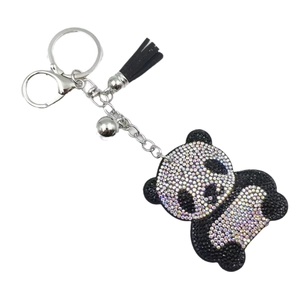 Sparkling panda keychain with rhinestones, silver bell, and black leather tassel charm