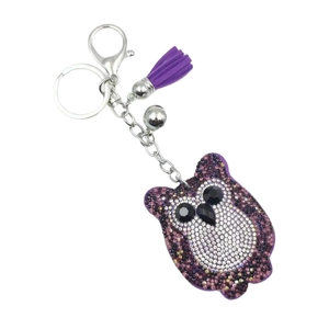 Porte-clés hibou à strass violets avec pompon en suède et clochette argentée