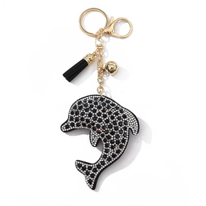 Luxury crystal dolphin keychain with black and white rhinestones and leather tassel