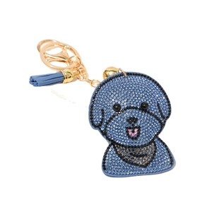 Porte-clés chien en strass bleus avec clochette dorée et élégant gland assorti