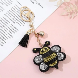 Cute rhinestone bee keychain with black leather tassel and golden bell accessory