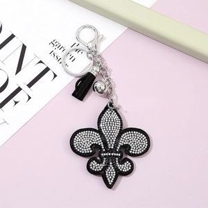 Porte-clés fleur de lys à la mode avec cristaux étincelants et pompon noir élégant