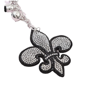 Porte-clés fleur de lys étincelant avec strass noirs et blancs et chaîne argentée