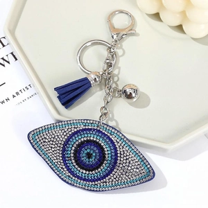 Portachiavi occhio del diavolo con strass blu e nappa di seta appesa a un anello metallo