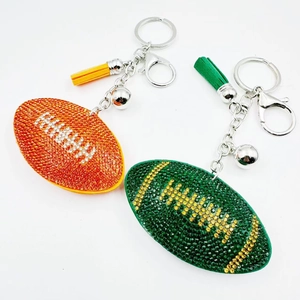 Portachiavi football americano con strass scintillanti nappa e campanellino argento