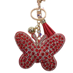 Red butterfly keychain with sparkling rhinestones, golden bell and elegant silk tassel charm