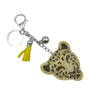 Porte-clés léopard de luxe avec strass, pompon jaune et fermoir mousqueton