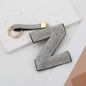 Porte-clés lettre Z en strass brillants avec anneau doré et dragonne chic