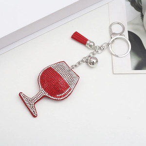 Porte-clés créatif en verre de vin avec strass rouges, pompon élégant et clochette argent