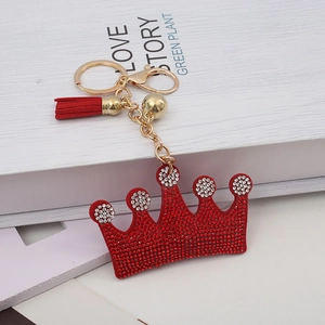 Red rhinestone crown keychain with gold metal hardware and stylish matching red tassel