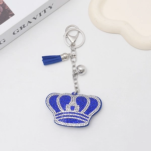 Portachiavi a corona scintillante con strass blu reale e ciondolo con nappina coordinata
