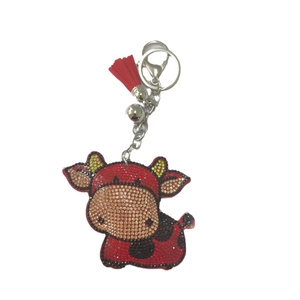 Porte-clés taureau mignon en strass avec pompon rouge et fermoir mousqueton argenté