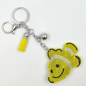Sparkling tropical clownfish keychain with yellow rhinestones and leather tassel accent