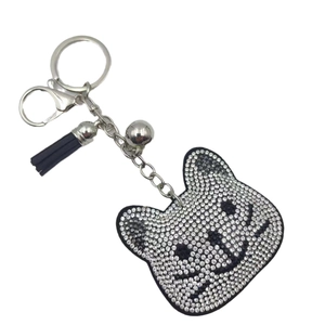 Sparkling rhinestone cartoon cat head keychain with silver bell and black tassel detail
