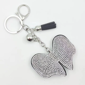Bowtie rhinestone keychain with leather tassel and bell on silver alloy ring