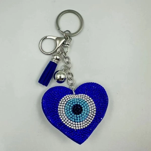 Blue rhinestone evil eye heart keychain with stylish tassel and silver bell accessory