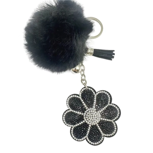 Chic black plush pompom keychain with rhinestone sunflower and leather tassel charm
