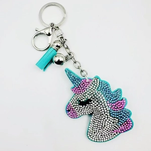 Sparkling crystal unicorn keychain with blue tassel and shiny rhinestones for bags