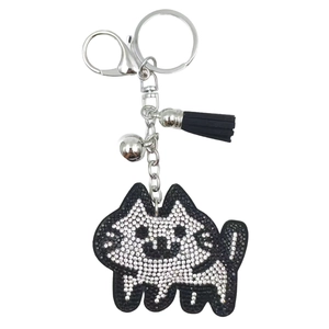 Sparkling cartoon husky dog keychain with black and white rhinestones and a black leather tassel
