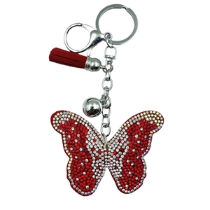 Porte-clés papillon en cristal scintillant avec pompon rouge et clochette argentée