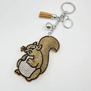 Sparkling squirrel keychain with rhinestones, metal ring, brown tassel and a small bell
