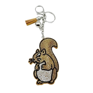 Sparkling crystal squirrel keychain with brown leather tassel and silver bell accessory