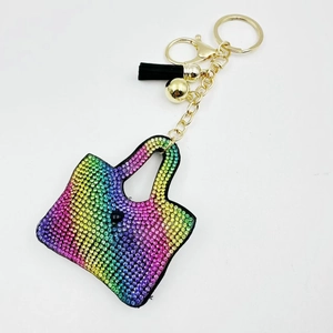 Porte-clés sac à main en strass arc-en-ciel avec pompon noir et pendentif doré