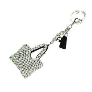 Porte-clés mini sac à main en strass avec pompon noir et clochette argentée élégante
