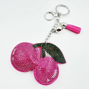 Porte-clés cerise en cristal rose scintillant avec clochette d'argent et pompon