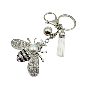 Sparkling crystal bee keychain with white pearl, silver tassel and bell accessory