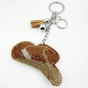 Sparkling crystal cowboy hat keychain with rhinestone accents and fringe tassel detail